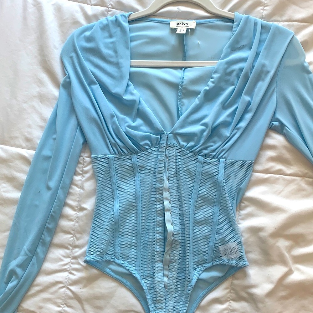 mystique Botique- small light blue body suit